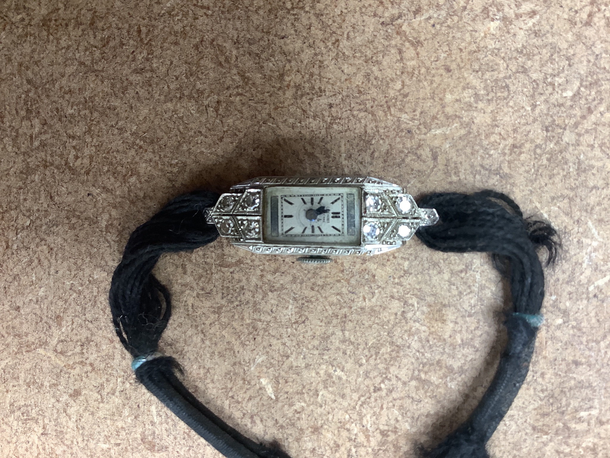 A quantity of mixed collectables including a ladies diamond set cocktail watch